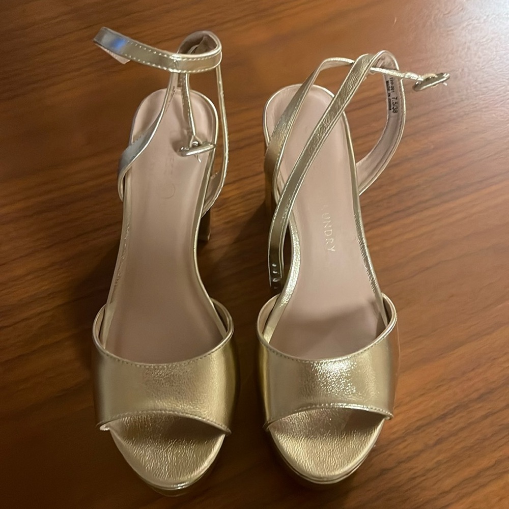 Gold platform sandals. Never worn. Size 7.5/38